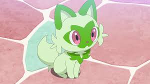 Sprigatito sitting on a brick ground